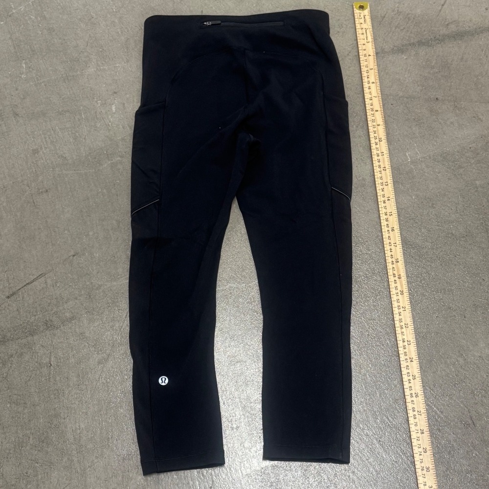 Lululemon Speed Up Crop Black Running Leggings Side Pockets Reflective Womens XS